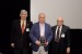 Prof. Grandon Gill, Chair of the Award Ceremony, and Dr. Nagib Callaos, General Chair, giving Prof. Aleksandras Vytautas Rutkauskas a plaque "In Appreciation for Delivering a Great Keynote Address at a Plenary Session."